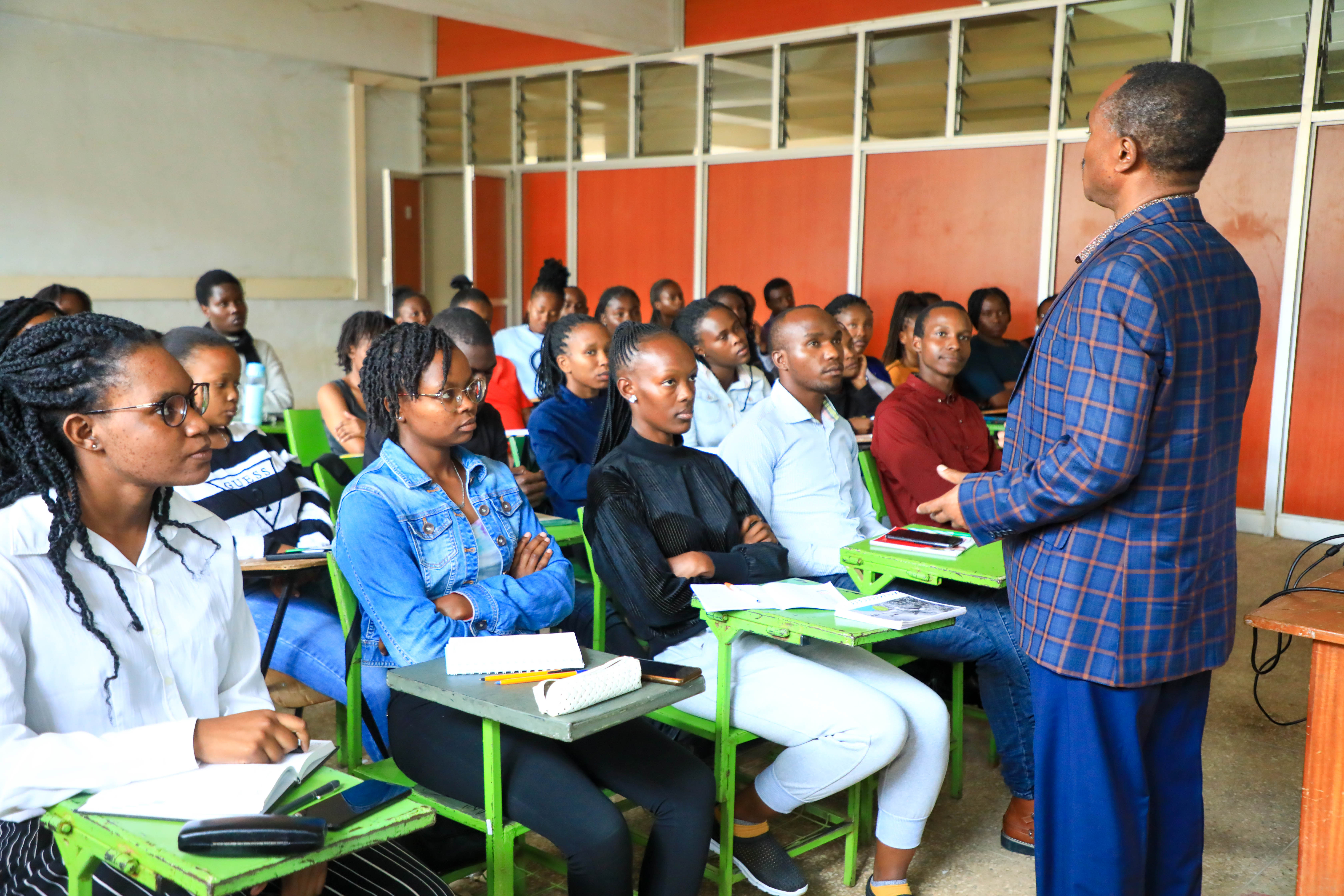 Dr. Joseph Matheri Mwangi, Chair Department of Rehabilitation Sciences engages the students during the forum