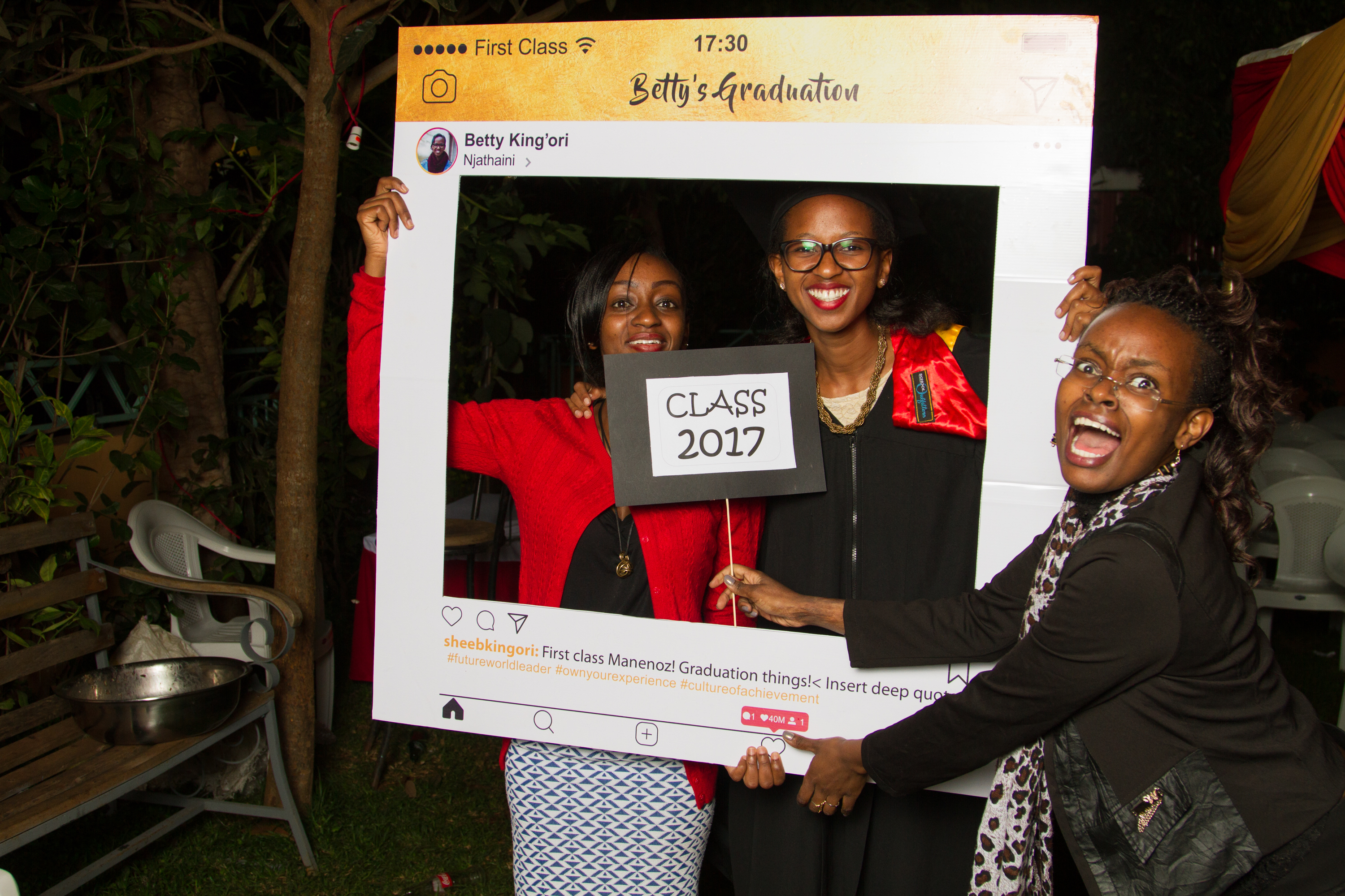 In this photo, Ms. Betty King'ori (centre) is seen with two adoring fans at her graduation party *insert emoji*