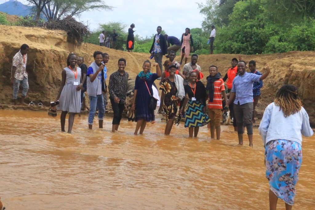 JKUAT CU missioners cross rivers entering village to village, learning and experiencing the beautiful Samburu culture firsthand.